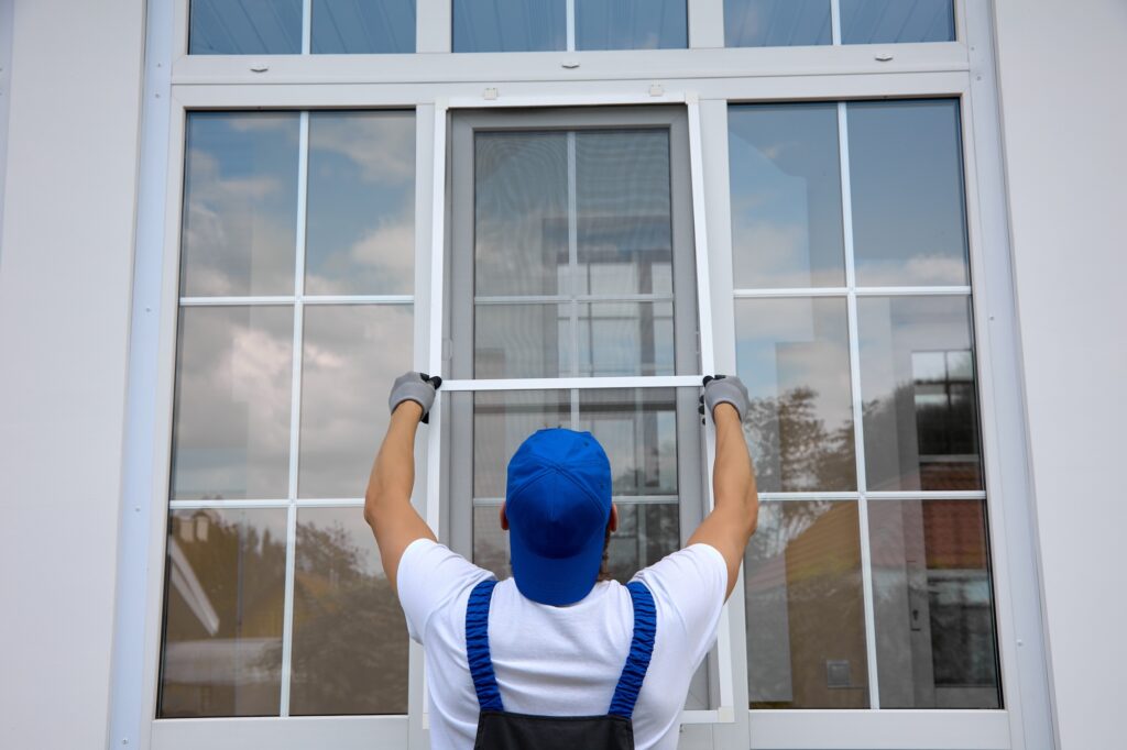 Professional installation of an additional insect net on the window